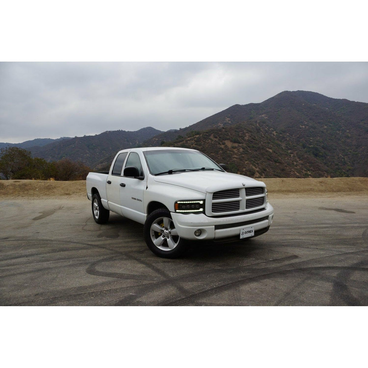 2002-2005 Dodge Ram 1500 2500 3500 | AlphaRex LUXX-Series LED Projector Headlights Alpha-Black - Truck Accessories Guy