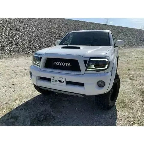 2005-2011 Toyota Tacoma | AlphaRex PRO-Series Projector Headlights Alpha-Black - Truck Accessories Guy