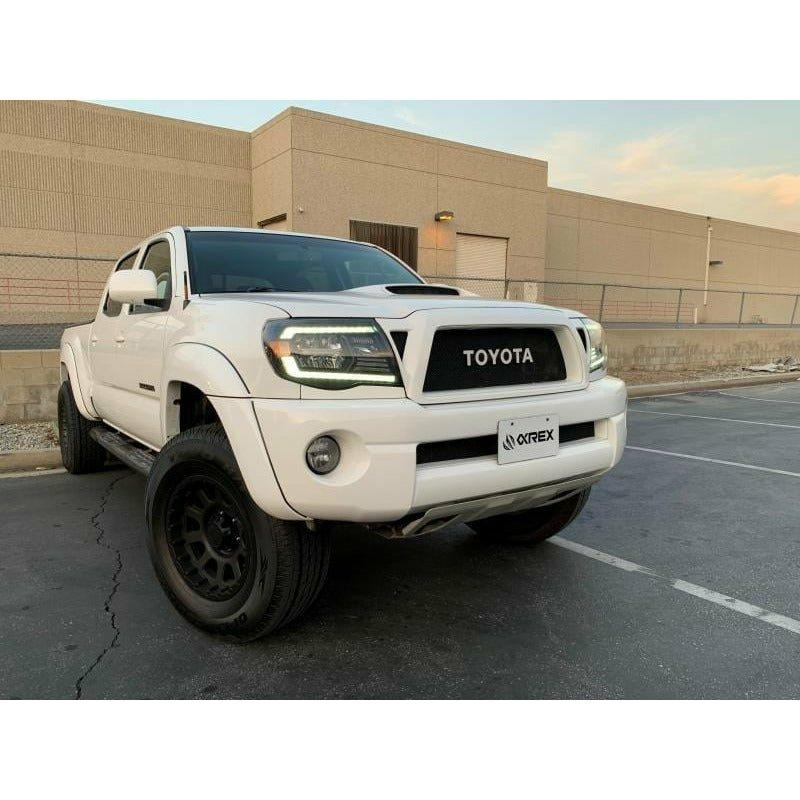 2005-2011 Toyota Tacoma | AlphaRex PRO-Series Projector Headlights Alpha-Black - Truck Accessories Guy