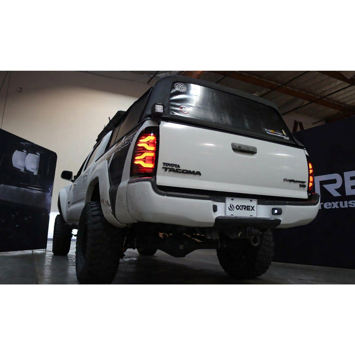 2005-2015 Toyota Tacoma | AlphaRex LUXX-Series LED Tail Lights Black - Truck Accessories Guy