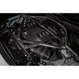 Eventuri gloss carbon CSL strut brace installed on BMW G8X M3 S58 engine bay