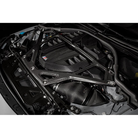 Eventuri gloss carbon CSL strut brace installed on BMW G8X M3 S58 engine bay
