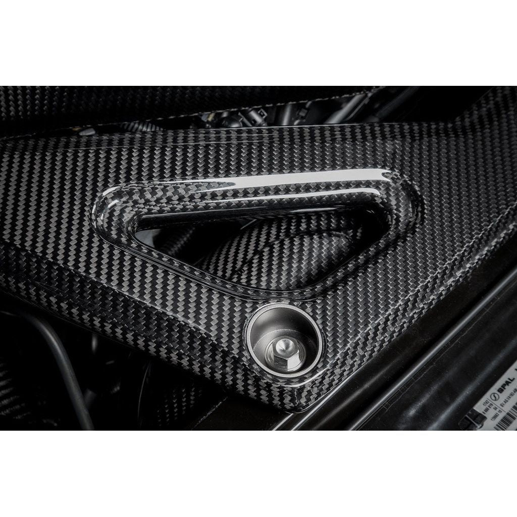 Eventuri gloss carbon CSL strut brace installed on BMW G8X M3 S58 engine bay