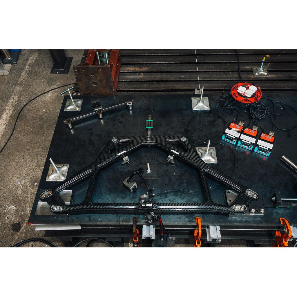 Independent laboratory test rig measuring deflection of Eventuri carbon strut brace