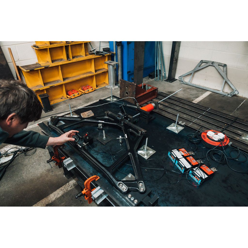 Independent laboratory test rig measuring deflection of Eventuri carbon strut brace