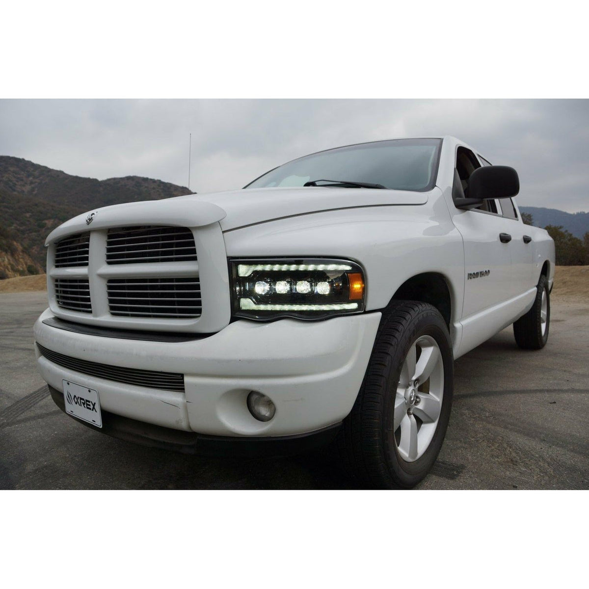 2002-2005 Dodge Ram 1500 2500 3500 | AlphaRex LUXX-Series LED Projector Headlights Alpha-Black - Truck Accessories Guy