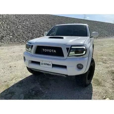 2005-2011 Toyota Tacoma | AlphaRex PRO-Series Projector Headlights Alpha-Black - Truck Accessories Guy