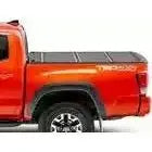 Load image into Gallery viewer, 2016-2023 Toyota Tacoma | BAK BakFlip MX4 Tonneau Covers 448426 - Truck Accessories Guy