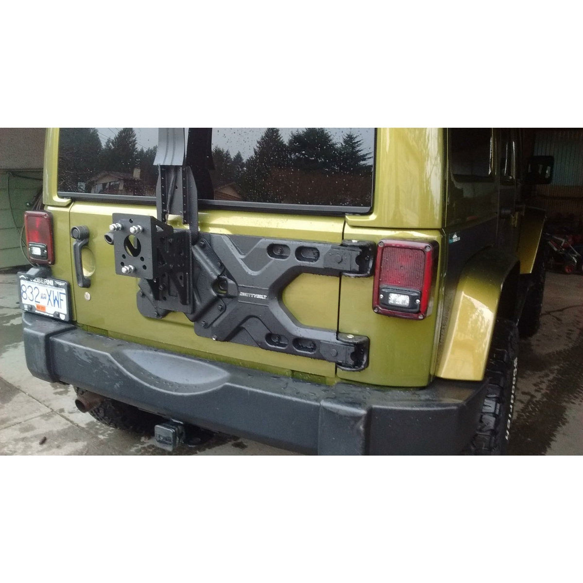 Smittybilt 2843 Pivot HD Oversize Tire Carrier for 2007-2018 Jeep Wrangler JK | Black - Truck Accessories Guy